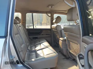2001 Toyota Land Cruiser z VIN JTEHT05J912007249, wystawiony jako IAAI lot #42409963 z przebiegiem 303 292 mil mil oraz . Historia ofert i sprzedaży dostępna na DreamBid. Obrazek 8.