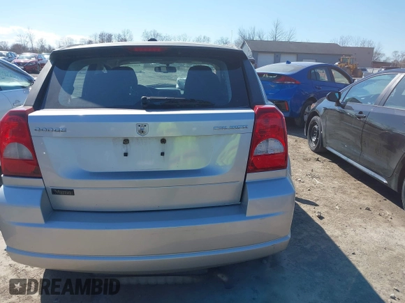2011 Dodge Caliber Mainstreet with VIN 1B3CB3HA9BD295750, listed as a IAAI auction lot 42049996 with Not Provided miles. Bid and sale history available at carsss.com. Image 16.
