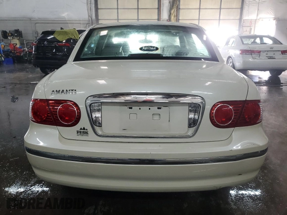 2004 Kia Amanti z VIN KNALD124X45045847, wystawiony jako Copart lot #44620865 z przebiegiem 48 833 mil mil oraz Szkoda całkowita • Salvage title. Historia ofert i sprzedaży dostępna na DreamBid. Obrazek 6.