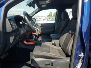 2022 Nissan Frontier Pro-X with VIN 1N6ED1EJ5NN610792, listed as a Copart auction lot 59897795 with 51,214 mi miles and Salvage title. Bid and sale history available at DreamBid. Image 7.