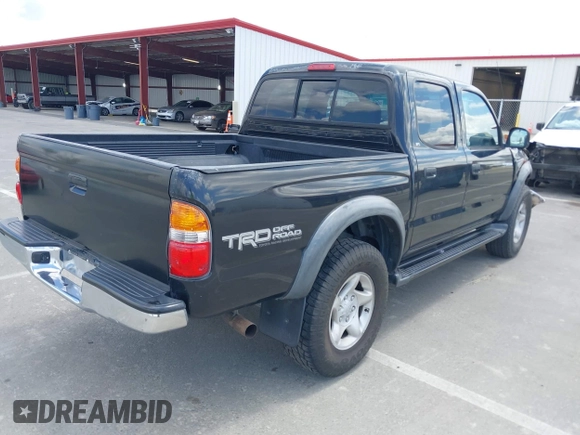 2003 Toyota Tacoma PreRunner z VIN 5TEGN92N03Z210194, wystawiony jako IAAI lot #42243037 z przebiegiem 241 047 mil mil oraz . Historia ofert i sprzedaży dostępna na DreamBid. Obrazek 4.