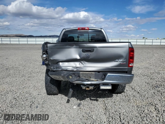 2005 Dodge 1500 SLT z VIN 1D7HU18D95S240346, wystawiony jako Copart lot #56873935 z przebiegiem 306 734 mil mil oraz Szkoda całkowita • Salvage title. Historia ofert i sprzedaży dostępna na DreamBid. Obrazek 6.