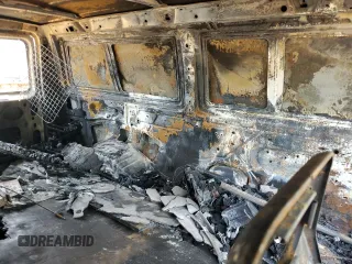 2000 Ford Econoline Cargo z VIN 1FTNE2424YHB40676, wystawiony jako Copart lot #53939115 z przebiegiem Nie podano mil oraz Szkoda całkowita • Salvage title. Historia ofert i sprzedaży dostępna na DreamBid. Obrazek 11.