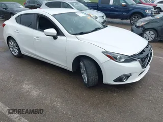 2014 Mazda 3 S Touring with VIN JM1BM1V36E1111496, listed as a IAAI auction lot 42427752 with 132,211 mi miles and . Bid and sale history available at DreamBid. Image 1.