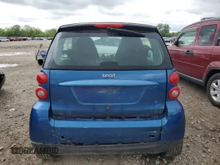 2009 Smart fortwo Pure z VIN WMEEJ31XX9K268413, wystawiony jako Copart lot #55853765 z przebiegiem 58 860 mil mil oraz Szkody całkowita. Historia ofert i sprzedaży dostępna na DreamBid. Obrazek 6.
