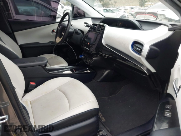 2016 Toyota Prius Four with VIN JTDKARFU8G3015083, listed as a IAAI auction lot 42191765 with 168,820 mi miles and . Bid and sale history available at DreamBid. Image 5.