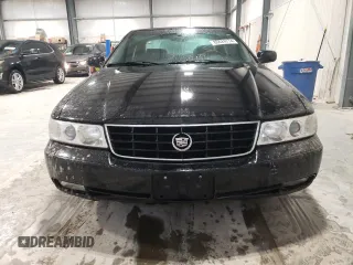 2002 Cadillac Seville Touring STS z VIN 1G6KY54962U158476, wystawiony jako Copart lot #86624774 z przebiegiem 77 818 mil mil oraz Szkoda całkowita • Salvage title. Historia ofert i sprzedaży dostępna na DreamBid. Obrazek 5.