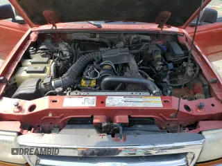 1998 Ford Ranger XL with VIN 1FTYR10C4WPB03883, listed as a Copart auction lot 64930944 with 257,722 mi miles and Salvage Title. Bid and sale history available at DreamBid. Image 11.