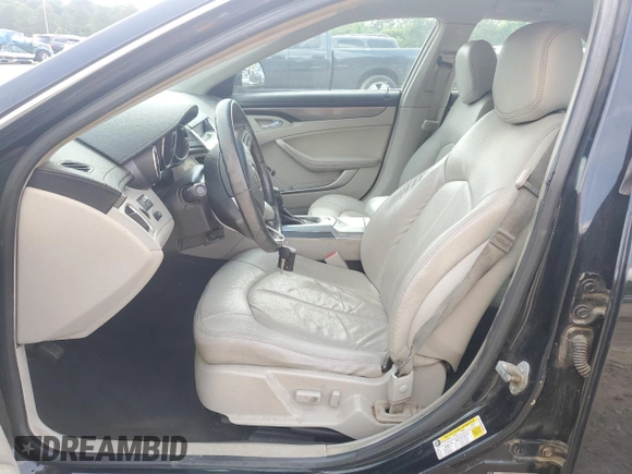 2012 Cadillac CTS z VIN 1G6DC5E52C0158356, wystawiony jako Copart lot #54679535 z przebiegiem 147 628 mil mil oraz Szkoda całkowita • Salvage title. Historia ofert i sprzedaży dostępna na DreamBid. Obrazek 7.
