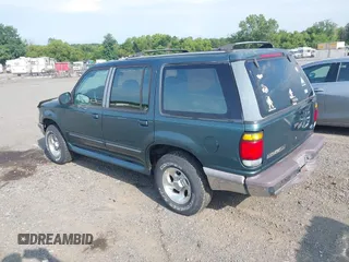1996 Ford Explorer XL with VIN 1FMDU34X3TUC22832, listed as a IAAI auction lot 42738515 with 165,408 mi miles and . Bid and sale history available at DreamBid. Image 3.
