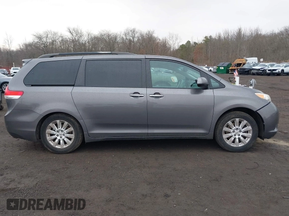 2012 Toyota Sienna XLE with VIN 5TDDK3DC7CS035444, listed as a IAAI auction lot 41640499 with 117,220 mi miles and . Bid and sale history available at DreamBid. Image 12.