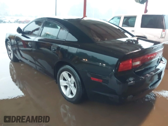 2014 Dodge Charger SE with VIN 2C3CDXBG8EH240828, listed as a IAAI auction lot 42158404 with 211,686 mi miles and . Bid and sale history available at DreamBid. Image 3.