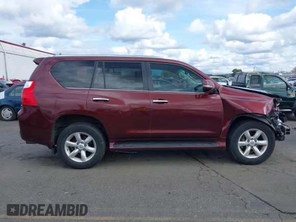 2011 Lexus GX 460 with VIN JTJBM7FXXB5022326, listed as a IAAI auction lot 41830166 with 180,976 mi miles. Bid and sale history available at carsss.com. Image 14.