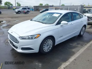2016 Ford Fusion SE Hybrid with VIN 3FA6P0LU7GR397310, listed as a IAAI auction lot 42075891 with 124,879 mi miles. Bid and sale history available at carsss.com. Image 17.