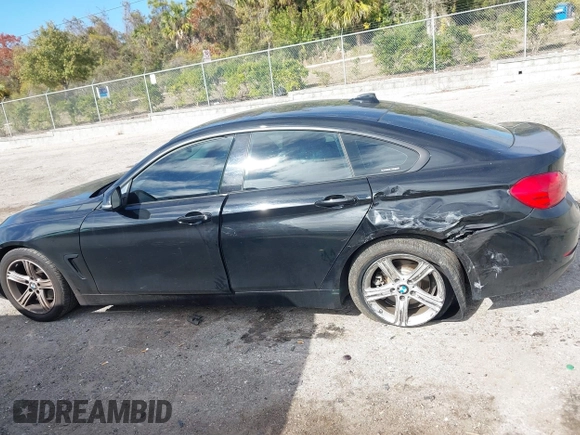 2015 BMW 4 Series 428i z VIN WBA4A9C58FGL85170, wystawiony jako IAAI lot #41362595 z przebiegiem 172 509 mil mil oraz . Historia ofert i sprzedaży dostępna na DreamBid. Obrazek 14.