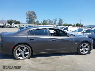 2016 Dodge Charger R/T with VIN 2C3CDXCT7GH233027, listed as a IAAI auction lot 37009912 with 132,960 mi miles. Bid and sale history available at carsss.com. Image 13.