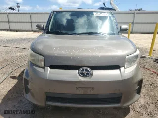 2012 Scion xB with VIN JTLZE4FE3C1144356, listed as a Copart auction lot 48751865 with 156,959 mi miles and Clean Title. Bid and sale history available at carsss.com. Image 5.