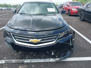 2015 Chevrolet Impala LT with VIN 2G1115SL7F9291433, listed as a IAAI auction lot 42130180 with 148,264 mi miles and . Bid and sale history available at DreamBid. Image 13.