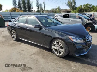 2014 Mercedes-Benz E E 350 Luxury with VIN WDDHF8JB2EA904536, listed as a Copart auction lot 51465715 with 92,159 mi miles and Salvage Title. Bid and sale history available at carsss.com. Image 4.