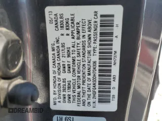 2013 Honda Civic Si z VIN 2HGFG4A50DH704306, wystawiony jako Copart lot #53569955 z przebiegiem 166 444 mil mil oraz Szkoda całkowita • Salvage title. Historia ofert i sprzedaży dostępna na DreamBid. Obrazek 12.
