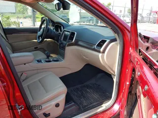 2014 Jeep Grand Cherokee Limited with VIN 1C4RJFBTXEC115239, listed as a IAAI auction lot 42352872 with 51,422 mi miles and . Bid and sale history available at DreamBid. Image 5.