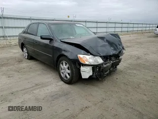 2000 Toyota Avalon XL with VIN 4T1BF28B4YU105732, listed as a Copart auction lot 54752665 with 143,855 mi miles and Salvage Title. Bid and sale history available at DreamBid. Image 13.