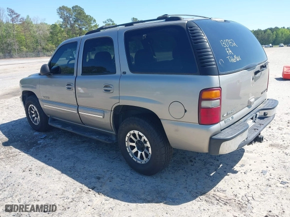 2001 Chevrolet Tahoe LS with VIN 1GNEK13T41R130752, listed as a IAAI auction lot 41966288 with 304,851 mi miles. Bid and sale history available at carsss.com. Image 3.
