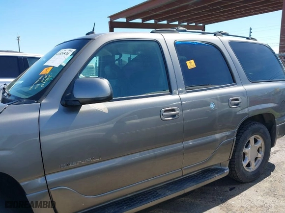 2005 GMC Yukon Denali with VIN 1GKEK63U35J149963, listed as a IAAI auction lot 41829530 with 243,575 mi miles. Bid and sale history available at carsss.com. Image 14.