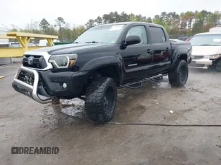 2015 Toyota Tacoma with VIN 3TMLU4EN9FM181683, listed as a IAAI auction lot 41980940 with 176,523 mi miles and . Bid and sale history available at DreamBid. Image 17.