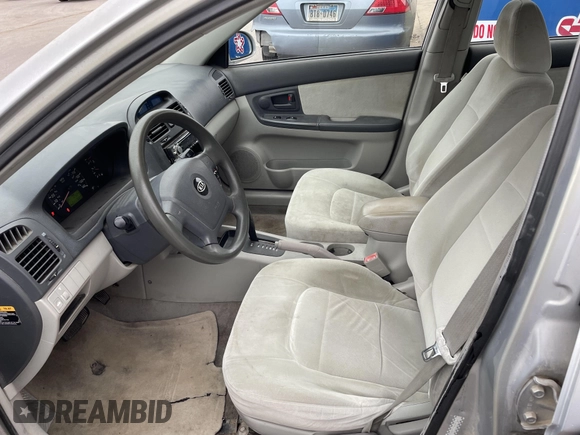 2004 Kia Spectra LX with VIN KNAFE121845043143, listed as a IAAI auction lot 41574523 with 211,758 mi miles. Bid and sale history available at carsss.com. Image 5.