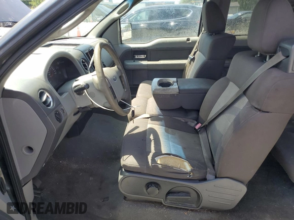 2006 Ford F-150 XLT with VIN 1FTRX12536KD75279, listed as a Copart auction lot 61761315 with 158,664 mi miles and Clean title. Bid and sale history available at DreamBid. Image 7.
