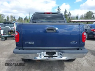 2003 Ford F-150 XLT with VIN 1FTRW08L93KD64270, listed as a IAAI auction lot 42088905 with 181,528 mi miles. Bid and sale history available at carsss.com. Image 16.