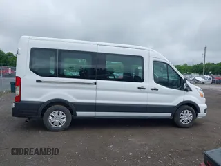 2022 Ford Transit Passenger XL with VIN 1FBAX2C86NKA79221, listed as a IAAI auction lot 42427641 with 56,245 mi miles and . Bid and sale history available at DreamBid. Image 13.