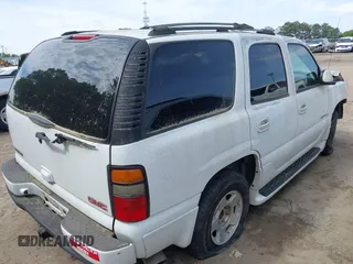 2004 GMC Yukon Denali z VIN 1GKEK63U34J166146, wystawiony jako IAAI lot #42097894 z przebiegiem Nie podano mil oraz . Historia ofert i sprzedaży dostępna na DreamBid. Obrazek 4.