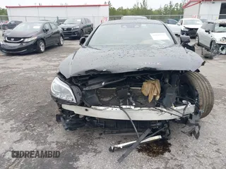 2018 Mercedes-Benz CLS-Class CLS 550 with VIN WDDLJ7DB5JA203692, listed as a IAAI auction lot 39840561 with 115,265 mi miles. Bid and sale history available at carsss.com. Image 12.