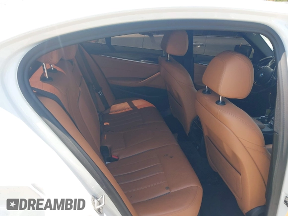 2018 BMW 5 Series 530e with VIN WBAJA9C58JB252868, listed as a IAAI auction lot 42323949 with 100,530 mi miles and . Bid and sale history available at DreamBid. Image 8.