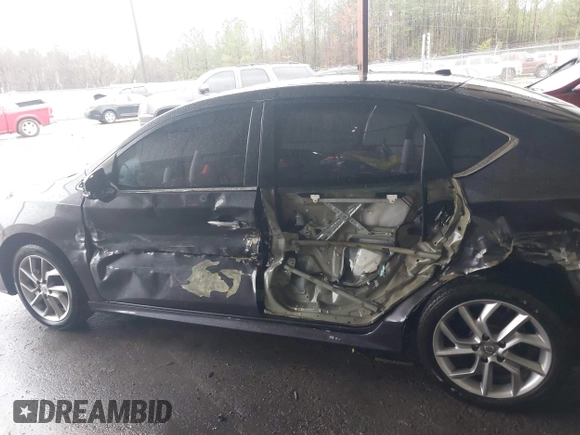 2015 Nissan Sentra SR with VIN 3N1AB7AP9FY347492, listed as a IAAI auction lot 41553625 with 206,010 mi miles and . Bid and sale history available at DreamBid. Image 15.
