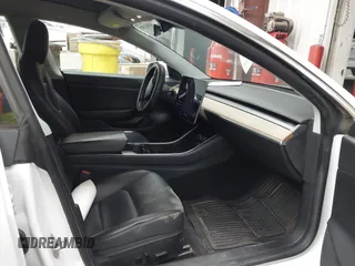2020 Tesla Model 3 Standard Range Plus with VIN 5YJ3E1EA7LF805828, listed as a IAAI auction lot 41841505 with 44,946 mi miles and . Bid and sale history available at DreamBid. Image 5.