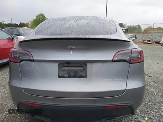 2024 Tesla Model Y Performance with VIN 7SAYGDEF2RA322351, listed as a IAAI auction lot 41953896 with 8,959 mi miles and . Bid and sale history available at carsss.com. Image 15.