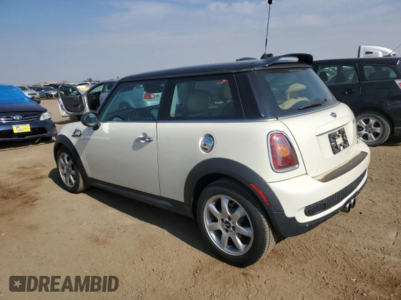 2009 MINI Hardtop S with VIN WMWMF73529TW81190, listed as a Copart auction lot 54172195 with 83,841 mi miles and Salvage Title. Bid and sale history available at DreamBid. Image 2.