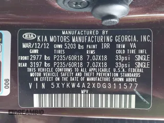 2013 Kia Sorento SX z VIN 5XYKW4A2XDG311577, wystawiony jako IAAI lot #42210698 z przebiegiem 152 599 mil mil oraz . Historia ofert i sprzedaży dostępna na DreamBid. Obrazek 9.