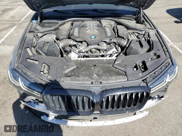 2022 BMW 5 Series M550i xDrive z VIN WBA13BK0XNCJ23778, wystawiony jako Copart lot #76946634 z przebiegiem 24 889 mil mil oraz Szkoda całkowita • Salvage title. Historia ofert i sprzedaży dostępna na DreamBid. Obrazek 11.