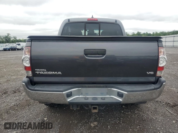 2015 Toyota Tacoma with VIN 3TMLU4EN6FM203591, listed as a Copart auction lot 58518185 with 149,729 mi miles and Salvage title. Bid and sale history available at DreamBid. Image 6.