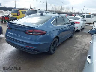 2019 Ford Fusion Energi Titanium with VIN 3FA6P0SU0KR111372, listed as a IAAI auction lot 41685702 with 107,407 mi miles. Bid and sale history available at carsss.com. Image 4.