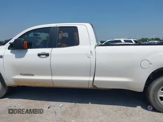2010 Toyota Tundra SR with VIN 5TFTY5F19AX006696, listed as a IAAI auction lot 42379570 with 332,246 mi miles and . Bid and sale history available at DreamBid. Image 14.