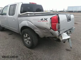 2011 Nissan Frontier PRO-4X with VIN 1N6AD0EV2BC438370, listed as a IAAI auction lot 41952484 with 217,529 mi miles. Bid and sale history available at carsss.com. Image 6.