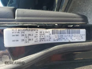 2002 Jeep Grand Cherokee Limited with VIN 1J8GW58NX2C158544, listed as a Copart auction lot 54937665 with 259,089 mi miles and Salvage title. Bid and sale history available at DreamBid. Image 13.
