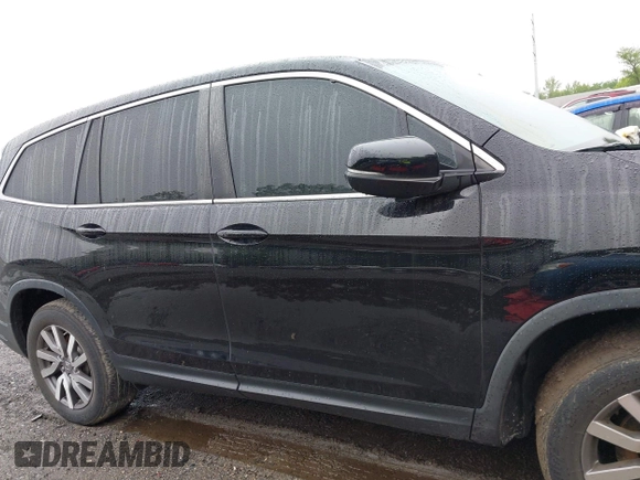 2022 Honda Pilot EX-L with VIN 5FNYF6H58NB018372, listed as a IAAI auction lot 42327580 with 79,332 mi miles and . Bid and sale history available at DreamBid. Image 13.