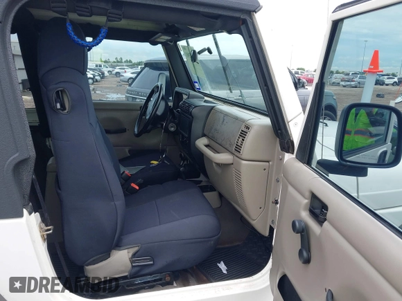 2003 Jeep Wrangler Sport with VIN 1J4FA49S43P362339, listed as a IAAI auction lot 41452901 with 208,128 mi miles and . Bid and sale history available at DreamBid. Image 5.