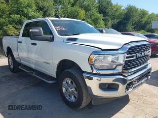 2024 Ram 2500 Big Horn with VIN 3C6UR5DJ2RG303949, listed as a IAAI auction lot 42575281 with 117,754 mi miles and . Bid and sale history available at DreamBid. Image 1.